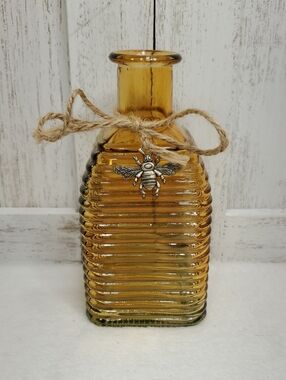 Amber Beehive Ribbed Glass Bottle with Bee Charm Attached with Jute